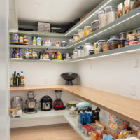 Thumbnail of http://Large%20walk-in%20pantry%20with%20open%20shelves.