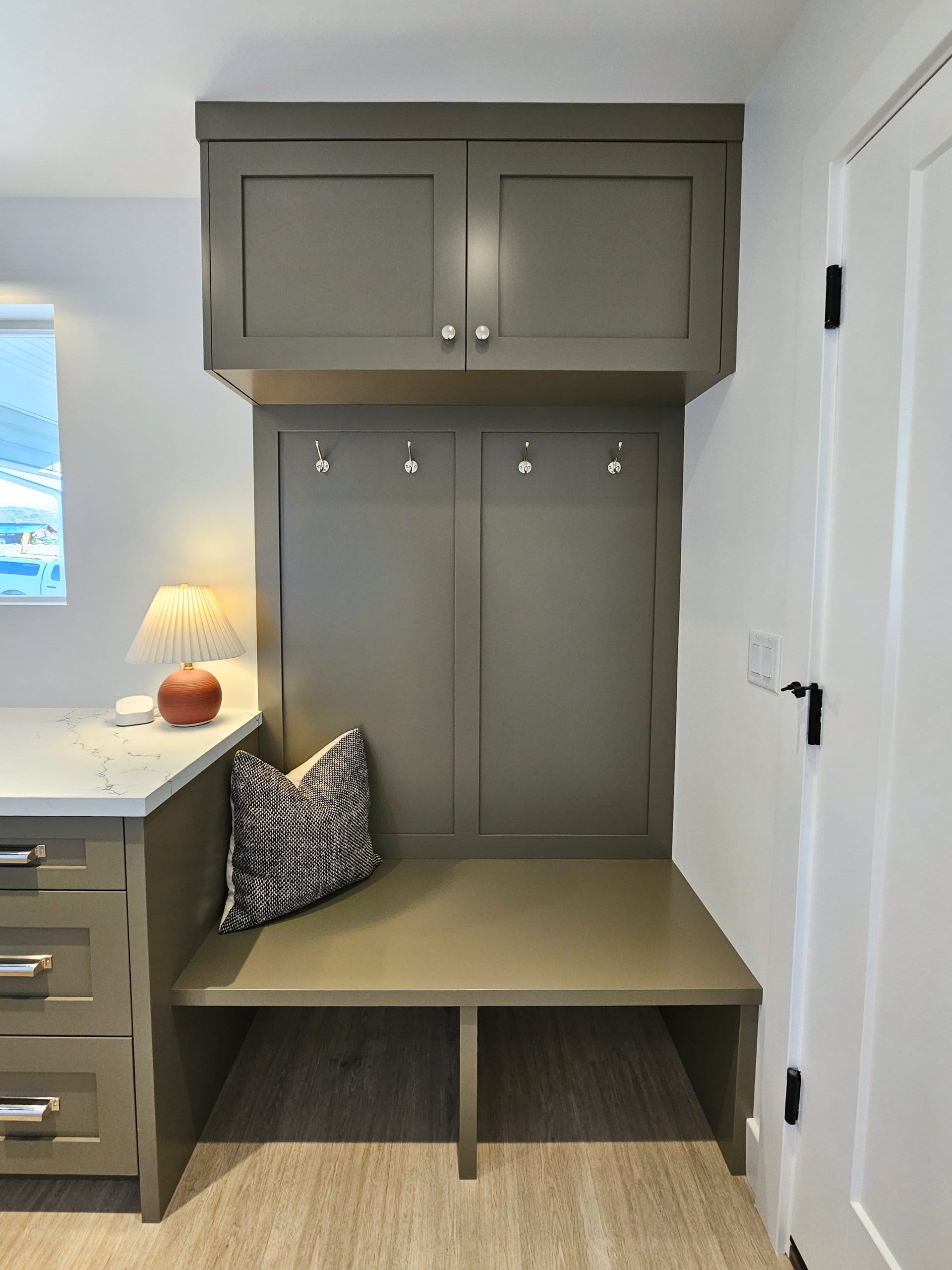Mudroom with built-in bench seat.