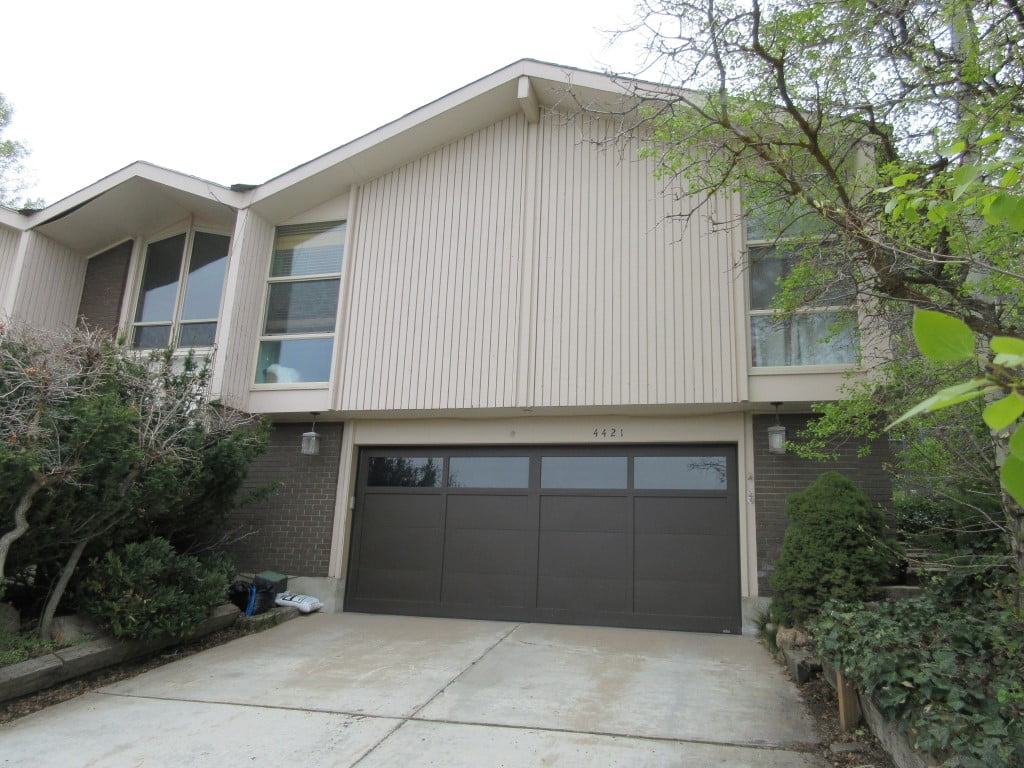 Exterior of a split level house before the remodel.