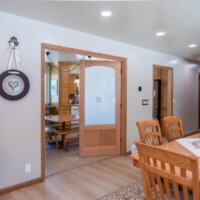 Thumbnail of http://View%20from%20the%20dining%20room%20to%20the%20kitchen%20through%20the%20two%20doors.