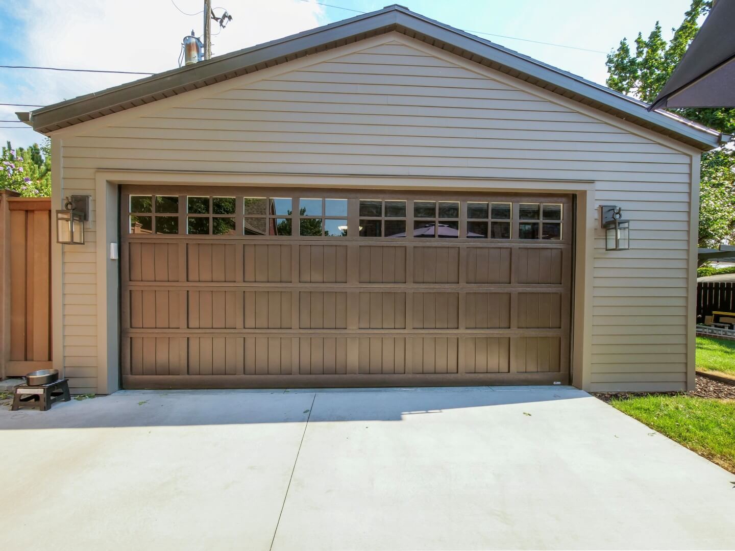 Exterior of two-car garage with door closed.