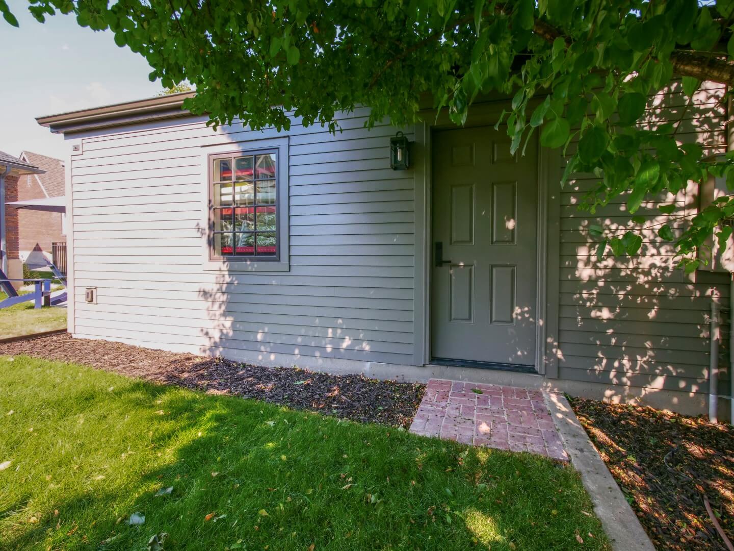 Exterior side door of garage.