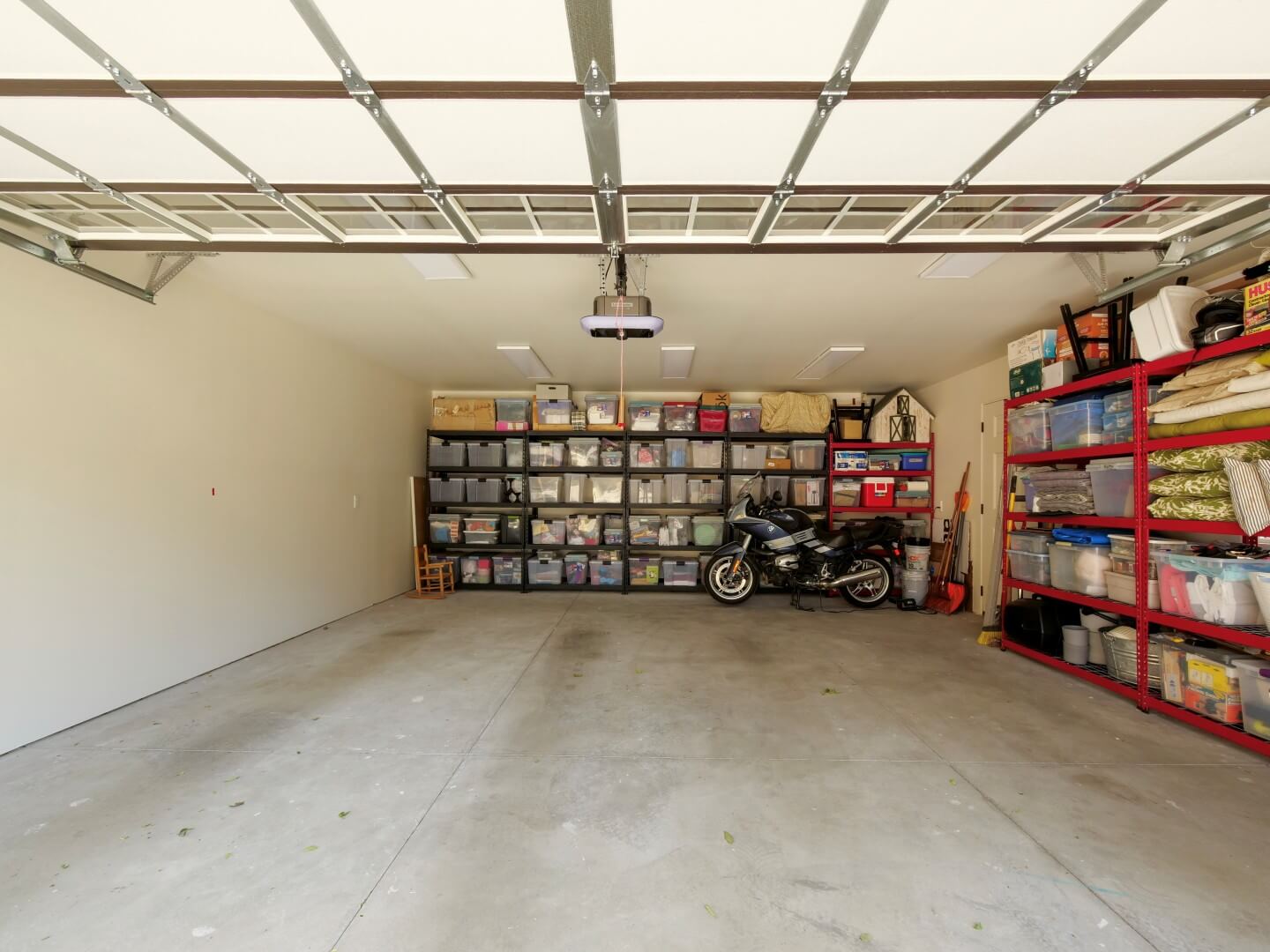 Two-car garage with door open.