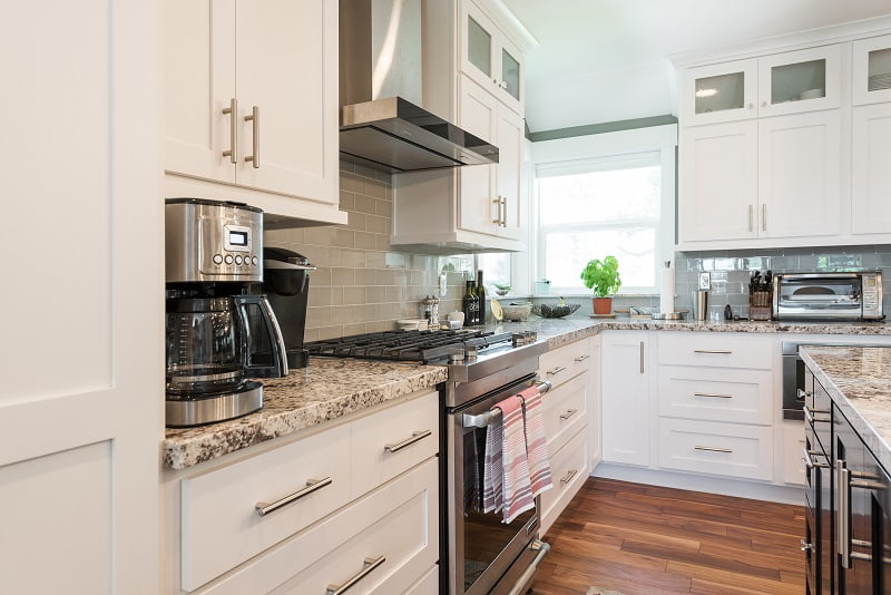 Cottage Kitchen Remodel White Cabinets Contemporary hardware | Renovation Design Group