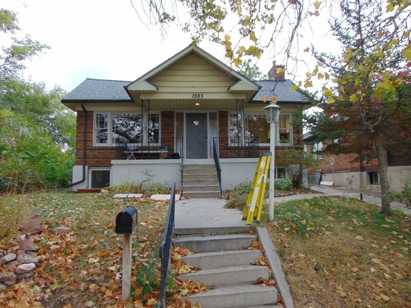 Bungalow style home exterior before.