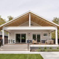 Thumbnail of http://Large,%20covered%20deck%20in%20the%20backyard.%20The%20space%20includes%20two%20doors%20with%20one%20being%20from%20the%20primary%20bedroom%20and%20the%20other%20from%20the%20living%20room,%20outdoor%20furniture,%20and%20a%20vaulted%20ceiling.